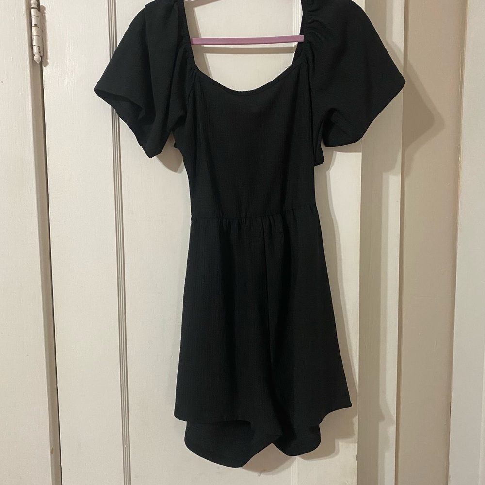 Open back, black romper